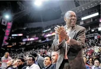  ?? Mark Mulligan / Staff photograph­er ?? Mayor Sylvester Turner cheers Dec. 16 during the Rockets game against the Spurs at Toyota Center. Use of sports suites by public officials isn’t carefully documented.