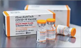  ?? PFIZER VIA AP, FILE ?? Child-size doses of the Pfizer COVID-19vaccine.