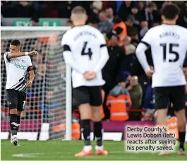  ?? ?? Derby County’s Lewis Dobbin (left) reacts after seeing his penalty saved.