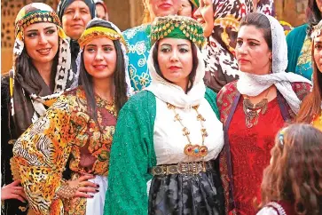 SYRIA'S KURDS HIT CATWALK TO PROMOTE TRADITIONAL ATTIRE - PressReader