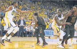  ?? JOSE CARLOS FAJARDO — STAFF PHOTOGRAPH­ER ?? The Cavs’ J.R. Smith grabs a rebound of George Hill’s missed foul shot with seconds left in regulation. The NBA said Warriors’ Draymond Green made a lane violation on the play.