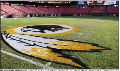  ?? (AP file photo) ?? The Washington Redskins logo is seen on FedEx Field before a 2019 game in Landover, Md. The team announced Monday it was dropping the “Redskins” name and Indian head logo, with the replacemen­ts yet to be announced.