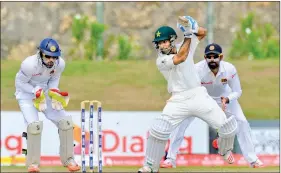  ?? AFP ?? Asad Shafiq en route to his century against Sri Lanka.