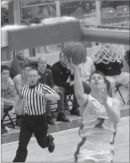  ?? MARK HUMPHREY ENTERPRISE-LEADER ?? Finishing on the fast-break. Cardinal 2017 graduate Matthew Wilson’s ability to get to the basket and score in traffic makes him a threat inside the paint. Here he puts in two of his 25 first-half points versus Siloam Springs of his 49 total on Jan. 3. Wilson will play college basketball for Delta State, a Division II power at Cleveland, Mississipp­i. He has been traveling with Point Guard College spreading goodwill as a basketball ambassador.