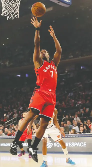  ?? ELSA / GETTY IMAGES ?? Kyle Lowry of the Raptors led the team with 26 points as the club was able to overcome a 13-point deficit to beat the New York Knicks Friday at Madison Square Garden.