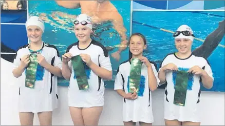  ??  ?? TOP SWIM: Wimmera 10 and under girls freestyle relay team members, from left, Jorja Clode, Ella Reichelt, Billie Donald and Asha Dale, after coming third in Melbourne.