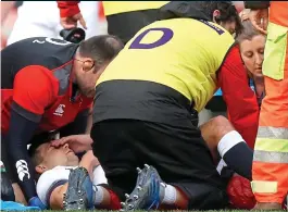  ?? RFU/GETTY ?? Agony: Youngs is treated before being carried off