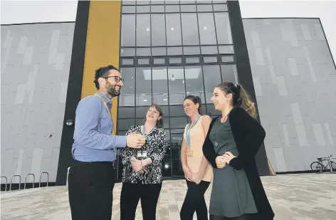  ??  ?? Staff member Steve Knowles chats to students Dawn Buckroyd, Holly Marshall, Anna Urbanczyk. Right, childcare tutor Trish Bayfield talks to new students Lauren Downie and Morgan Smith.