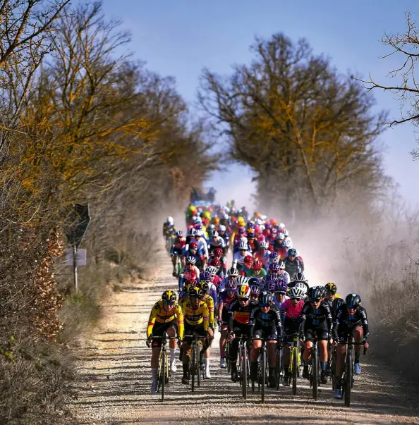  ?? ?? Opposite top Elisa Longo Borghini is victorious at this year’s Paris-Roubaix Opposite bottom The summit finish of the Col d’Izoard from La Course in 2017 Above Gravel, as in this year’s Strade Bianche, will feature in the 126km stage 4