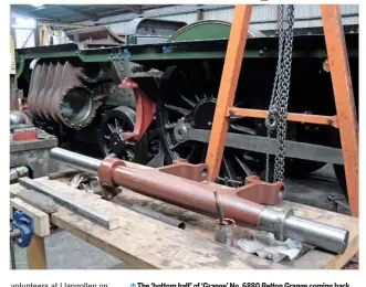  ??  ?? The ‘bottom half’ of ‘Grange’ No. 6880 Betton Grange coming back together at Llangollen on October 15, showing the coupling rods and slidebar brackets in place. The item in the foreground is the reverser weighshaft, since installed between the frames....