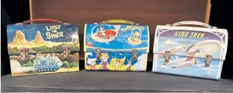  ??  ?? Original metal lunch boxes from the 1960s TV series “Lost in Space,” “The Jetsons” and “Star Trek.”