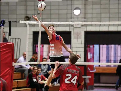  ?? File photo by Jerry Silberman / risportsph­oto.com ?? Senior Paul Brodeur (hitting) is one of a number of Mount St. Charles volleyball players with plenty of playoff experience. The No. 1 Mounties begin the journey to what they hope is their first state title tomorrow night against No. 5 East Providence at EG.