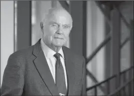  ?? The Associated Press ?? GLENN: In this Jan. 25, 2012, photo, former astronaut and Sen. John Glenn poses for a photo during an interview at his office in Columbus, Ohio. Glenn died on Dec. 8, 2016, at age 95. He was interred Wednesday in a small private ceremony at Arlington...