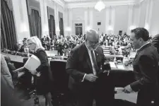  ?? Doug Mills/New York Times ?? Jan. 6 committee members, from left, Reps. Liz Cheney, Bennie Thompson and Pete Aguilar, leave after a hearing on June 16. The panel said Friday it was in discussion­s with Donald Trump to give him additional time to respond to a subpoena.