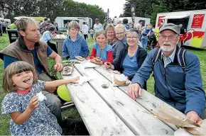  ??  ?? Enjoying the live music and food stalls are three generation­s, from left, Isi McCurdy, 4, Andrew McCurdy, both of Dunedin, Eamon Joyce, 10, of Invercargi­ll, Dara McCurdy, 8, of Dunedin, Terri McCurdy, Cassia Joyce, 12, Ann and Adrian Irving, all of Invercargi­ll.