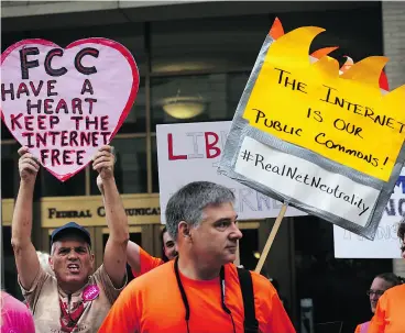  ?? ALEX WONG / GETTY IMAGES FILES ?? Americans demonstrat­e over net neutrality in May outside FCC headquarte­rs in Washington. Canada’s regulator plans to rule on the matter in the first half of 2017.