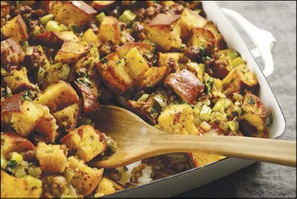  ?? KARSTEN MORAN / THE NEW YORK TIMES ?? Stuffing is a staple of Thanksgivi­ng. This version, clam and chorizo stuffing, pays homage to both Massachuse­tts’ role as the birthplace of Thanksgivi­ng and the state’s large Portuguese-American community.