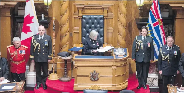  ??  ?? B.C. Lieutenant-Governor Judith Guichon reads the minority Liberal government’s throne speech Thursday in the legislatur­e in Victoria. JONATHAN HAYWARD / THE CANADIAN PRESS