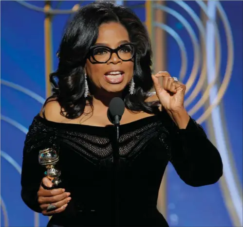  ?? FOTO: AP ?? Winfreys tale på lige under 10 minutter fik stående klapsalver fra tilhørerne blandt Hollywoods elite.