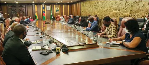  ?? Photo: Contribute­d ?? Joining hands…The NCCI board (left) yesterday paid a courtesy visit to President Hage Geingob and other high ranking government officials (right).