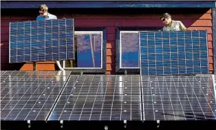  ?? JERRY MCBRIDE AP FILE ?? The Inflation Reduction Act increased the credit for solar installati­ons. Homeowners can get a tax credit for 30 percent of the cost to buy and install solar panels — up from 26 percent.