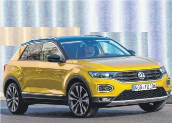  ?? FOTOS: VW ?? Goldstück: Die gerade so angesagte Zweifarbla­ckierung macht den T-Roc wahrlich zu einem Hingucker.