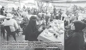  ?? — Gambar Bernama ?? MENJADI PILIHAN: Hampir setiap pagi, terutama pada hujung minggu, deretan motosikal termasuk yang berkuasa tinggi memenuhi ruang letak kenderaan di depan sebuah kafe ala warung.