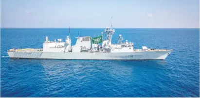  ?? LS ZACHARIAH STOPA, CANADIAN FORCES COMBAT CAMERA ?? HMCS Regina flies the Saskatchew­an Roughrider­s flag at sea while deployed on Operation Artemis on April 9, 2019.