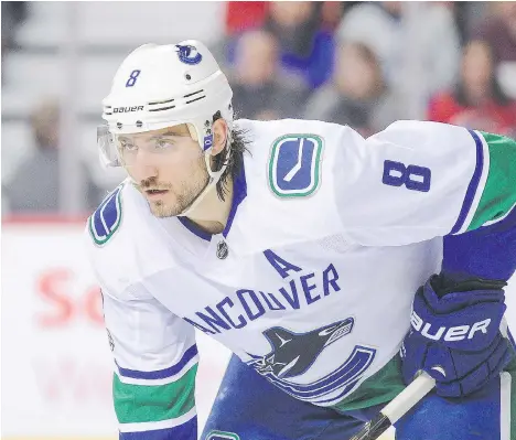  ?? DEREK LEUNG/GETTY IMAGES ?? Chris Tanev has two of the Canucks’ three goals so far this season from the defence. Apparently now over a thumb injury suffered in a game against the Calgary Flames on Nov. 7, look for him to play 20 minutes a night, a developmen­t that will ripple...