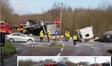  ??  ?? The emergency services and Gardai attended a crash which involved two trucks at Ballymaqui­rke Cross. Photos: Adrian Grajewski