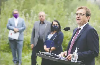  ?? JIM WELLS ?? Federal Environmen­t Minister Jonathan Wilkinson, speaking in Calgary on Tuesday, said projects like the Springbank Dam are crucial in disaster-proofing Canada. “We must adapt to climate change.”