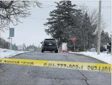  ?? DAVE JOHNSON THE WELLAND TRIBUNE ?? A police cruiser sits on the west side of Roland Road at Effingham Street in Pelham last Friday morning, a day after a cop-on-cop shooting.