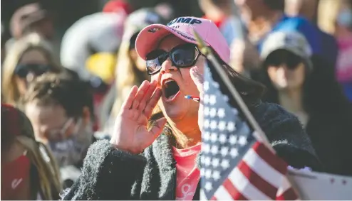  ?? JOHN MOORE / GETTY IMAGES ?? Frustrated Trump supporters demonstrat­e Friday in Detroit, three days after the U.S. election, as Democrat Joe Biden's vote count grows.