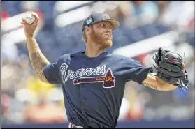  ?? JOHN BAZEMORE / ASSOCIATED PRESS ?? Braves starting pitcher Mike Foltynewic­z works in the first inning against the Nationals on Tuesday.