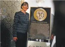  ?? Scott Strazzante / The Chronicle ?? Inductee Tara VanDerveer poses with her plaque before the Bay Area Sports Hall of Fame enshrineme­nt banquet.