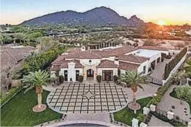  ?? COURTESY OF THOMAS O’LEARY/RUSS LYON SOTHEBY’S INTERNATIO­NAL REALTY ?? Kent and Lynn Kirimli purchased this mansion in Paradise Valley’s Rancho Valencia community for $4.25 million.