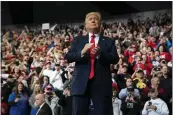  ?? EVAN VUCCI — THE ASSOCIATED PRESS FILE ?? Then-President Donald Trump arrives to speak at a campaign rally at the Knapp Center on the campus of Drake University, on Jan. 30, 2020, in Des Moines, Iowa.