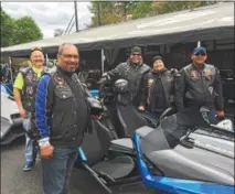  ?? PAUL POST — PPOST@DIGITALFIR­STMEDIA.COM ?? Members of The Bronx-based Familias United motorcycle group are among the many people on hand at Americade in Lake George. From left to right are Harry Lopez, Angel Vazquaz, club President Yoed Rosado, Sylvana Cruz and Luis Jimenez.