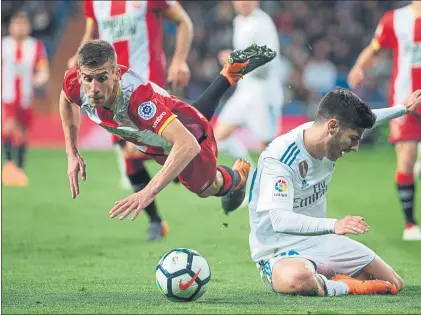  ?? FOTO: EFE ?? El Girona no pudo lograr los tres puntos Fue arrollado por un Madrid que fue muy ofensivo pero también permisivo