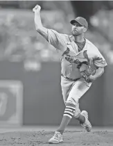  ?? JULIO CORTEZ/AP ?? Cardinals starting pitcher Adam Wainwright throws against the Orioles on Tuesday in Baltimore.