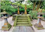  ??  ?? William Adams is depicted arriving in Japan in 1600, right; a memorial stone for Adams and his wife in Tsukayama Park in Yokosuka, left; and below, his 1707 map of Japan