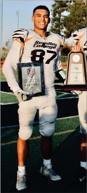  ?? CONTRIBUTE­D DANIEL BACA ?? Reedley College’s Daniel Baca, left, accepted a full-ride scholarshi­p to play football for NCAA Division I Duquesne University earlier this month.