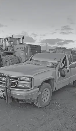  ?? Photo courtesy of Nome Police Department ?? WRECK— A cable strung across Port Road destroyed the cab of a truck traveling southbound on the road.