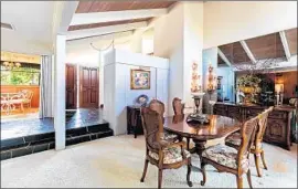  ?? Anthony Barcelo ?? THE HOME’S interior retains a host of 1970s details but bears little resemblanc­e to the studio set familiar to TV viewers. Buyer HGTV plans to restore the home.