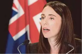  ?? AFP ?? New Zealand Prime Minister Jacinda Ardern addresses the media at the Parliament in Wellington yesterday.