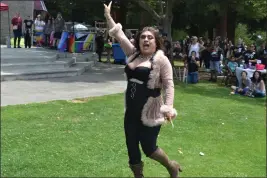  ?? NICK SESTANOVIC­H — THE REPORTER ?? Drag performer Miss Alexia dances and lip-syncs to Christina Aguilera's “Let There Be Love” at Vacaville's second Pride in the Park event at Andrews Park.