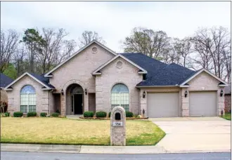  ?? LINDA GARNER-BUNCH/Arkansas Democrat-Gazette ?? This home, located at 154 Marseille Drive in Maumelle, has about 2,482 square feet and is listed for $289,500 with Lisa Holloway-Sugg and Donna Ibbotson of Crye-Leike Realtors, Maumelle. No open house is planned for today. For more informatio­n or to...