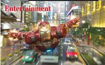  ??  ?? GUESTS at HK Disneyland can now “fly” alongside Iron Man through the city.