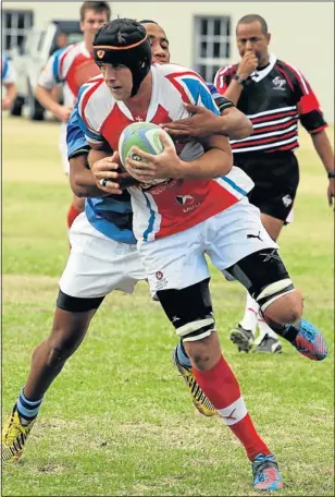  ?? Picture EUGENE COETZEE ?? DOWN TO EARTH: Crusaders No 8 Joe Anderson is tackled by Progress centre Marlon Bruintjies in their Super 12 club rugby encounter at the weekend