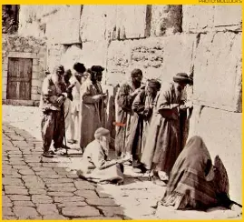  ?? PHOTO: MULLOCK’S ?? Worshipper­s at the Western Wall captured by 19th-century photograph­er P Bergheim. A set of 48 of his images of the Holy Land, dating from the 1860s, will go on sale at Mullock’s auction house in Shropshire next month